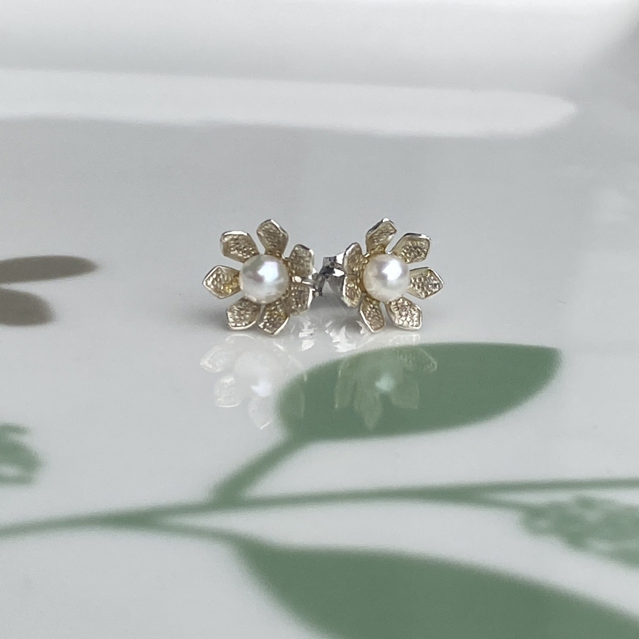 Silver Petals Akoya pearl earrings front view