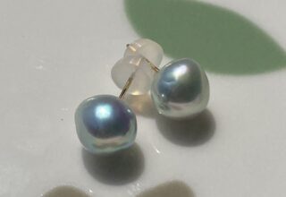 Natural blue Akoya pearl stud earrings with deep blue-green color