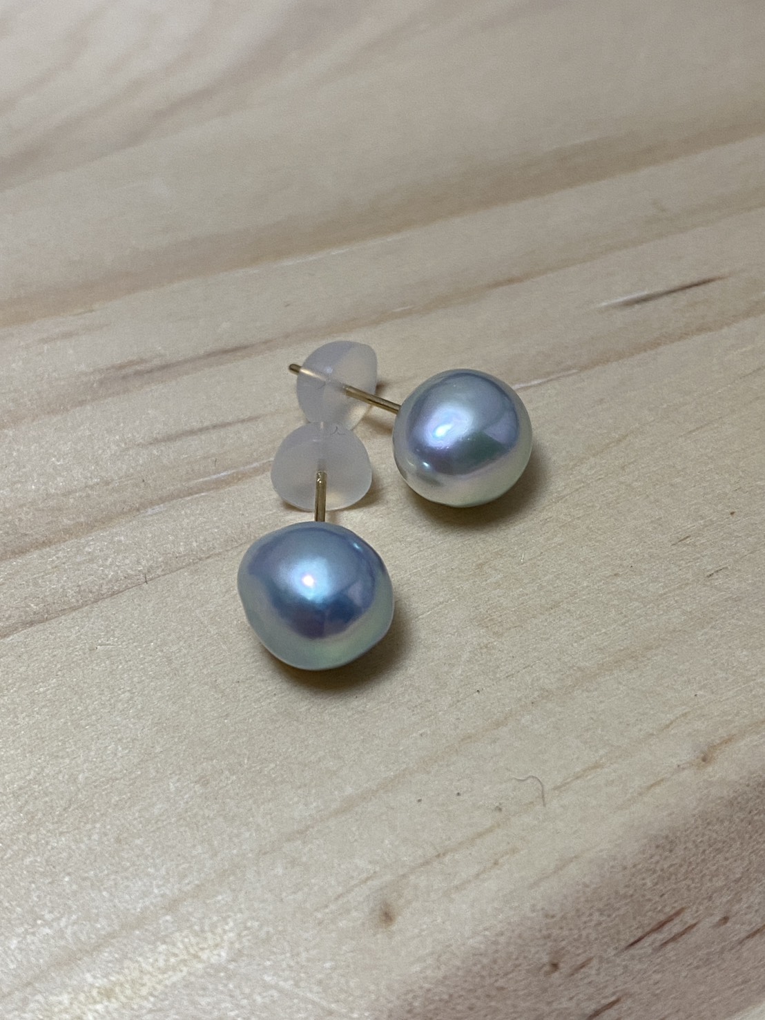 Natural blue Akoya pearl earrings with green and blue overtones