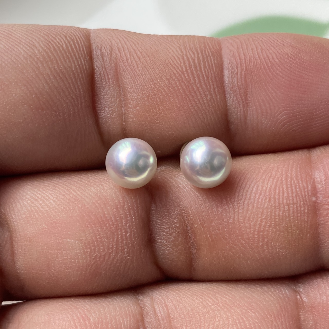Natural Blue Akoya pearl stud earrings, front view