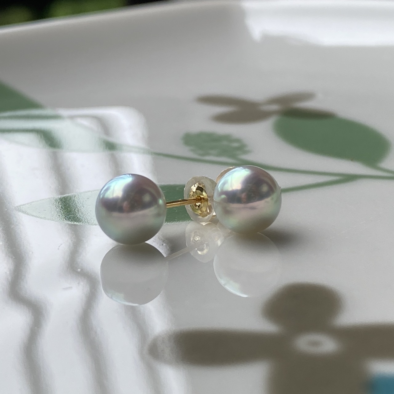 Natural Blue Akoya earrings reflecting green and pink tones