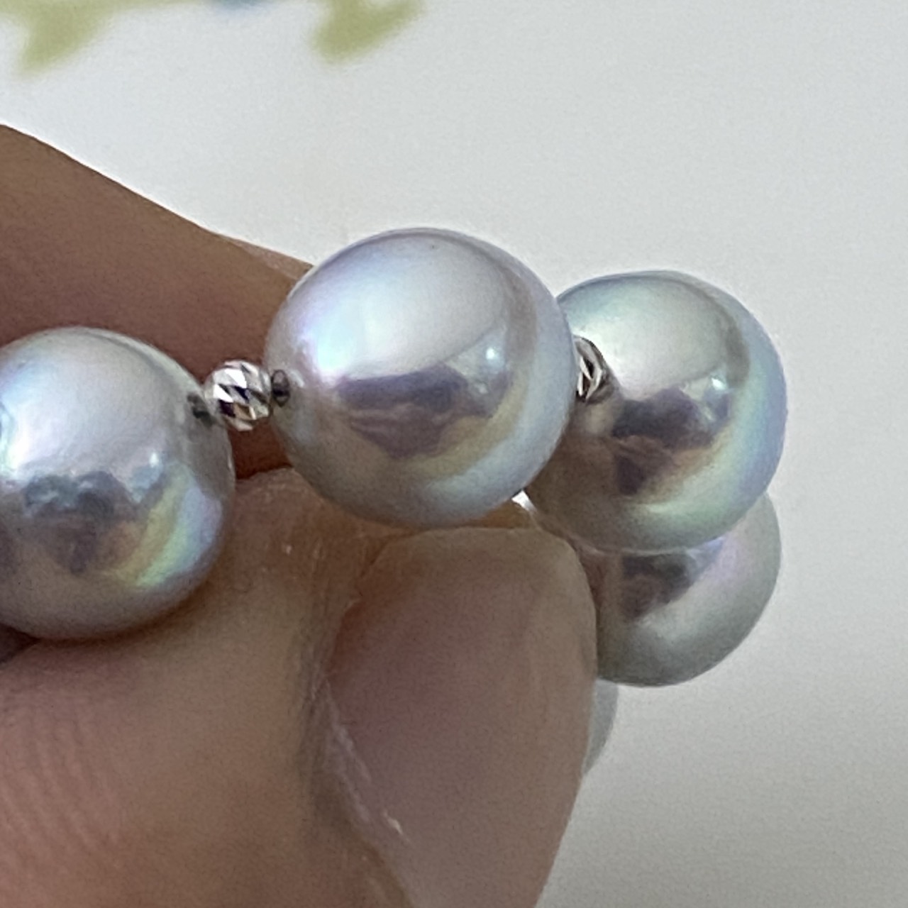 Close-up of natural blue Akoya pearls with K18 white gold mirror balls