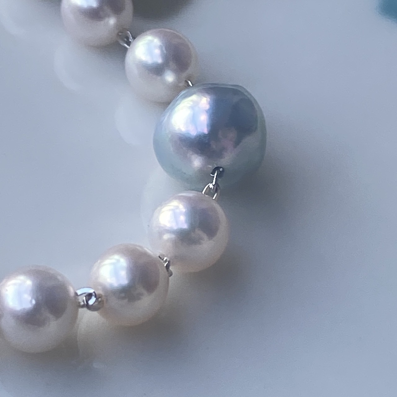 Natural blue baroque Akoya pearl with pink interference colors